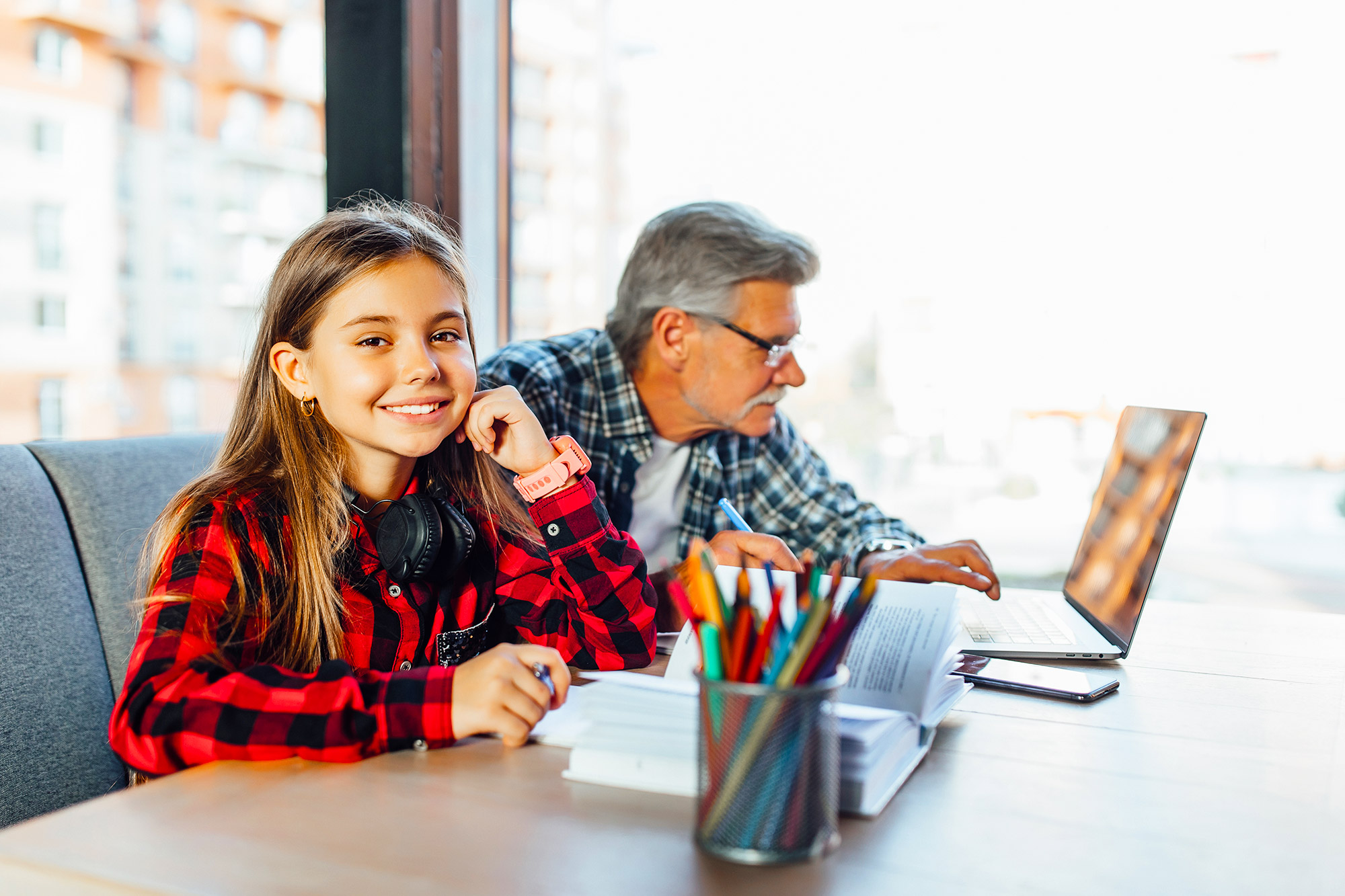 Brainline student doing homework with grandfather